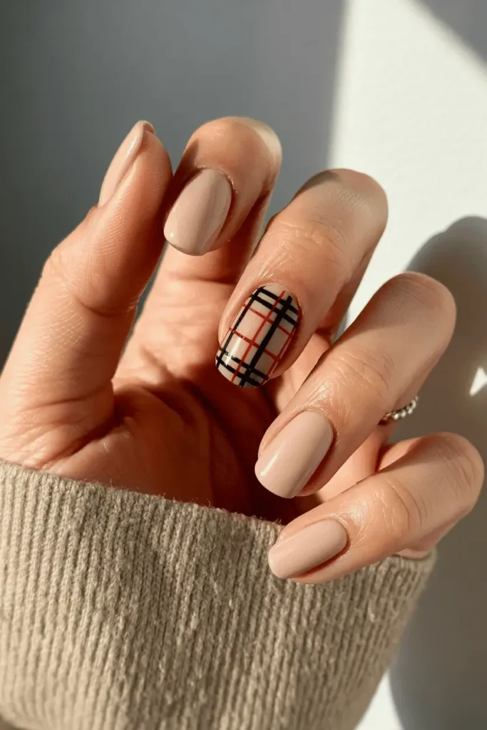 3D cable-knit textured nude nails styled with sweater props.